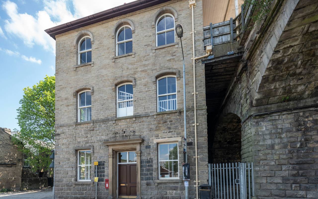 Vacant office unit in Mytholmroyd located on a ground floor city street.